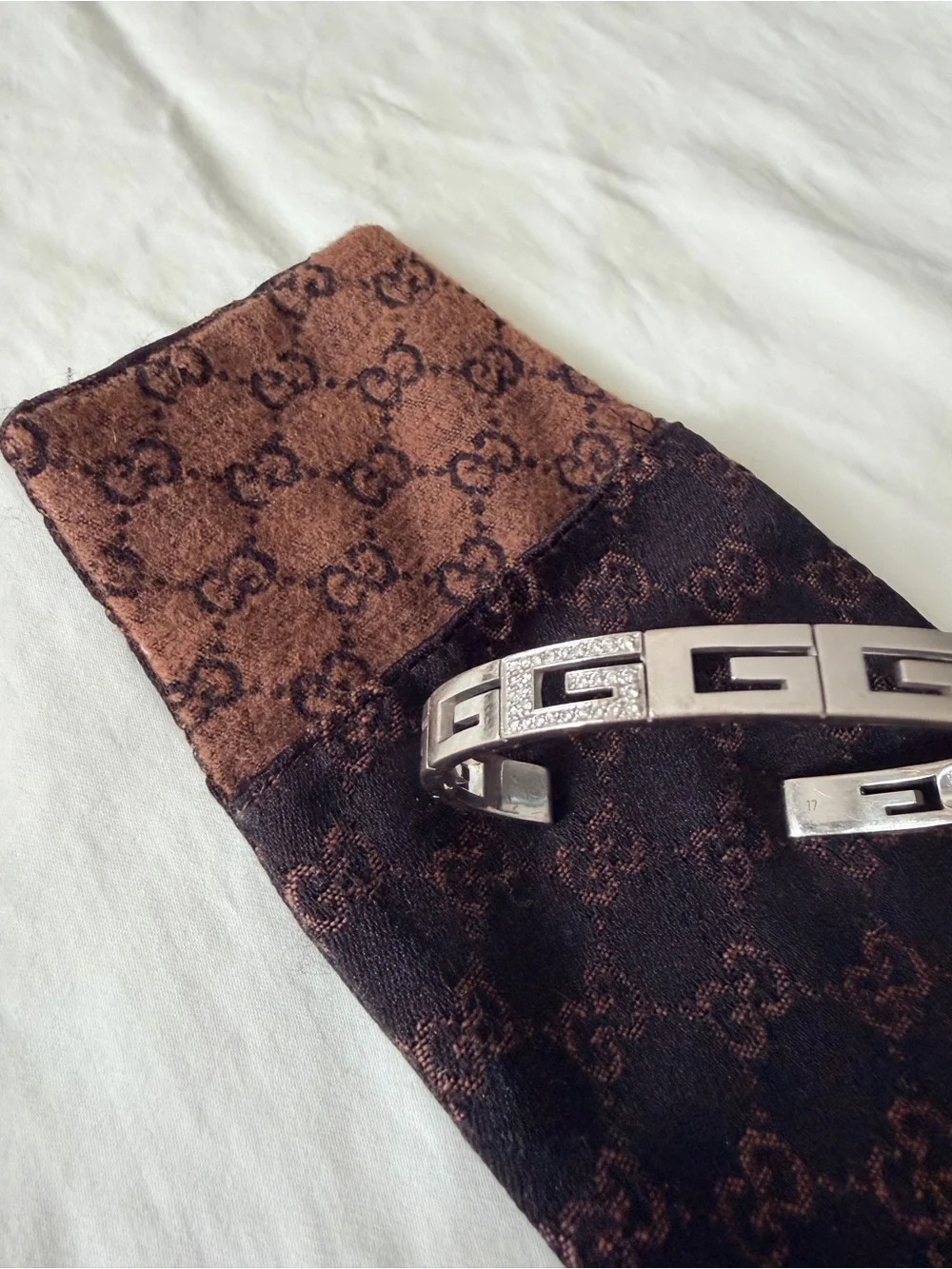 GUCCI White Gold/Diamond “G” logo bracelet